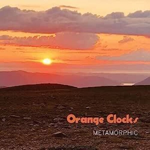 Orange Clocks: Metamorphic