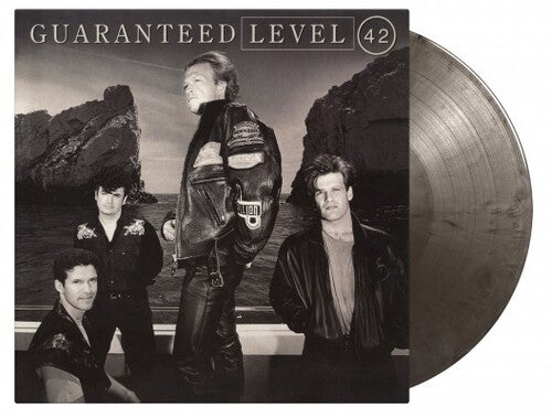 Level 42: Guaranteed - Limited Expanded, 180-Gram Silver & Black Marble Colored Vinyl with Bonus Tracks