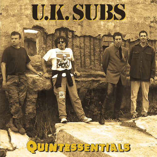 UK Subs: Quintessentials - YELLOW/BLACK SPLATTER