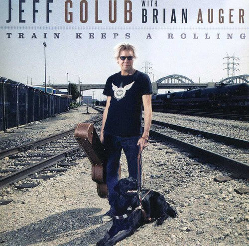 Golub, Jeff: Train Keeps a Rolling