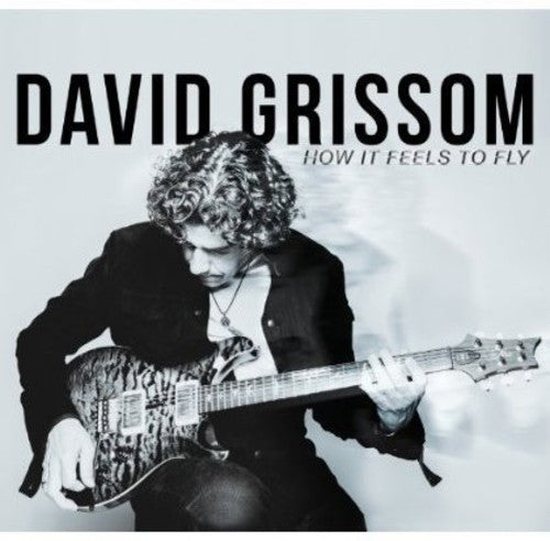 Grissom, David: How It Feels to Fly