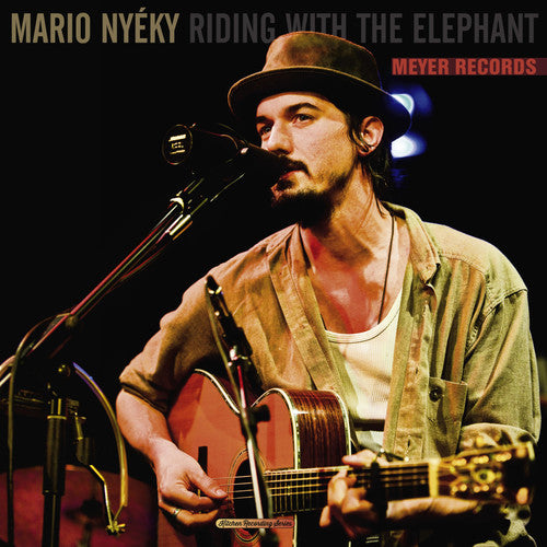 Nyeky, Mario: Riding with the Elephant